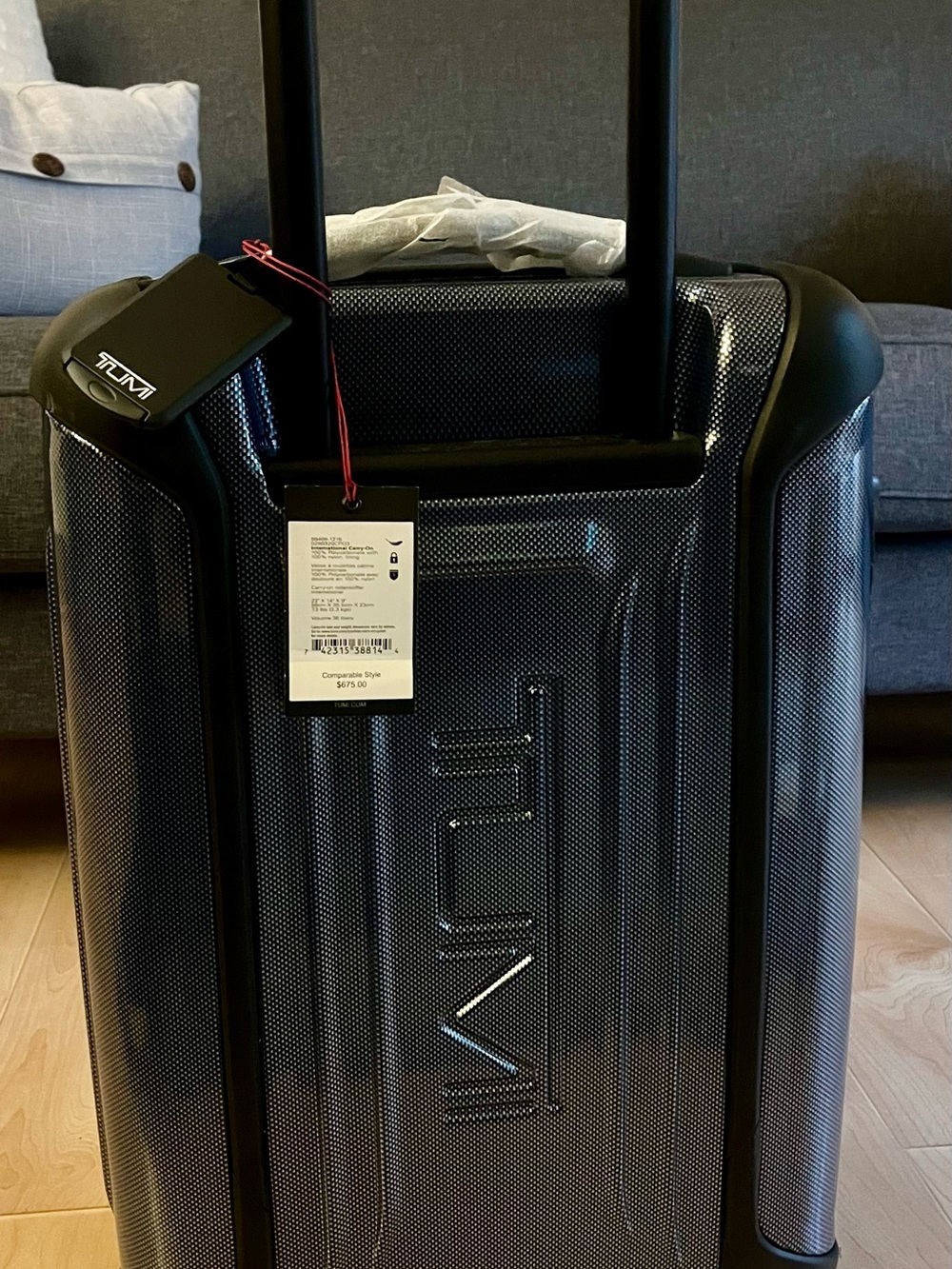 Tumi Hard-Shell Carry-On in Dark Gray with Black Accents